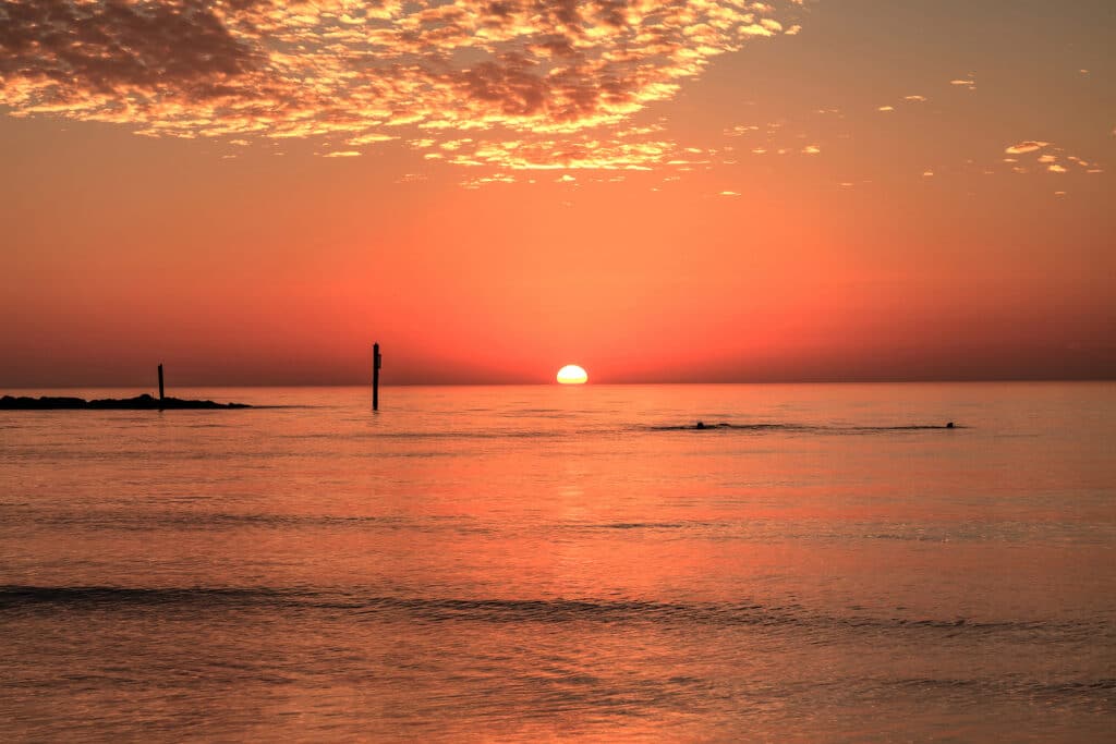 Swim At Sunset With A Red Sky Over South Marco Island Beach